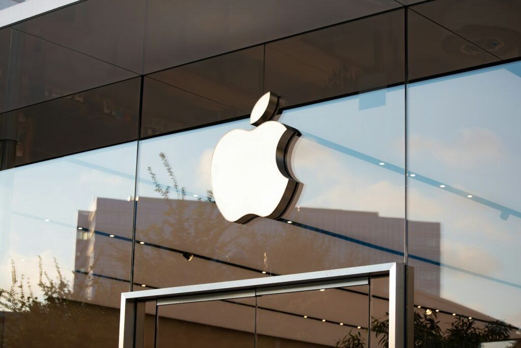 Monochrome Apple logo in a minimalist interior
